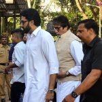 Amitabh Bachchan and Abhishek Bachchan at the funeral.