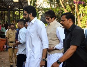 Amitabh Bachchan and Abhishek Bachchan at the funeral.